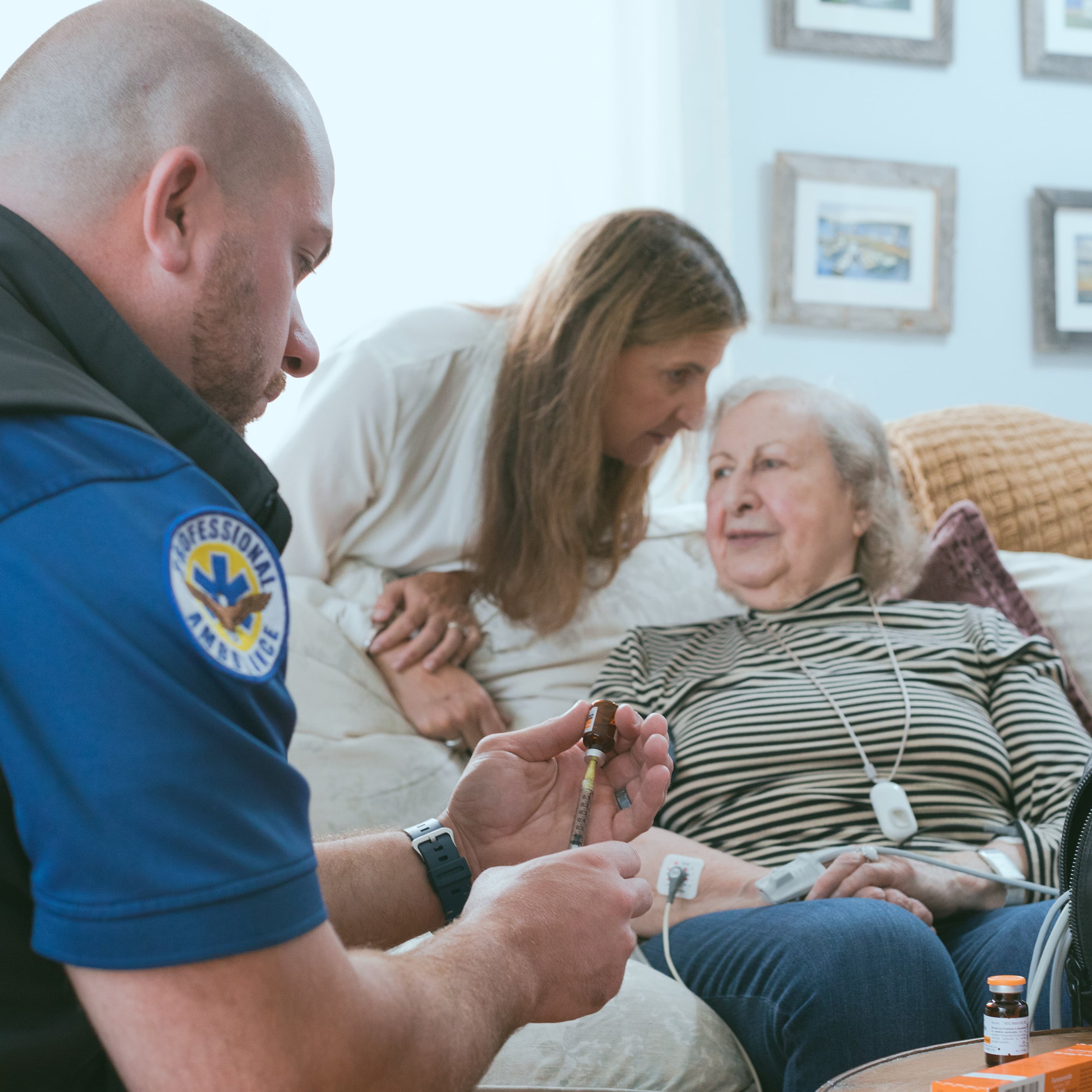 EMT helping women in home